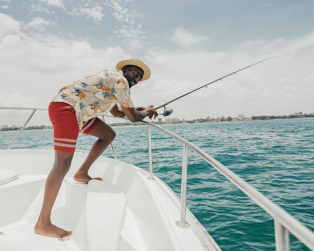 Man Fishing on a Yacht